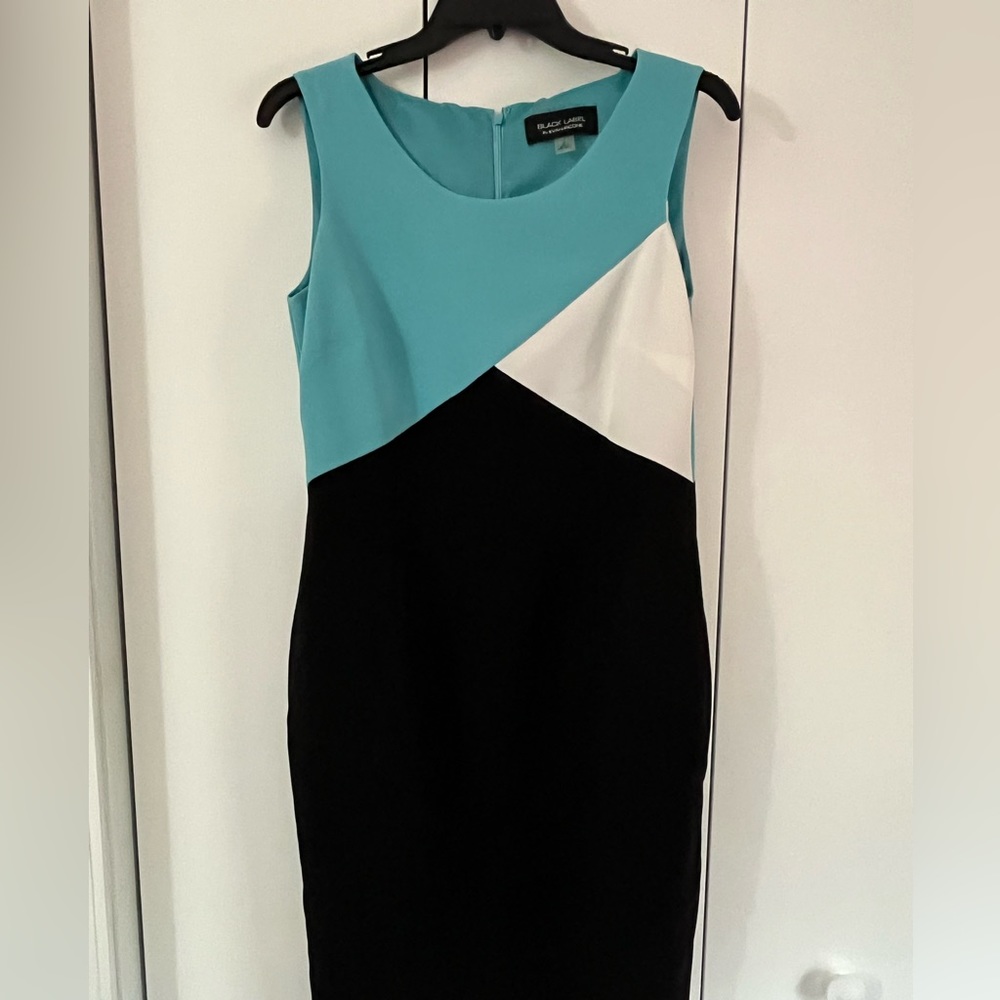 Black label fitted dress. Size medium. Cropped shoulders